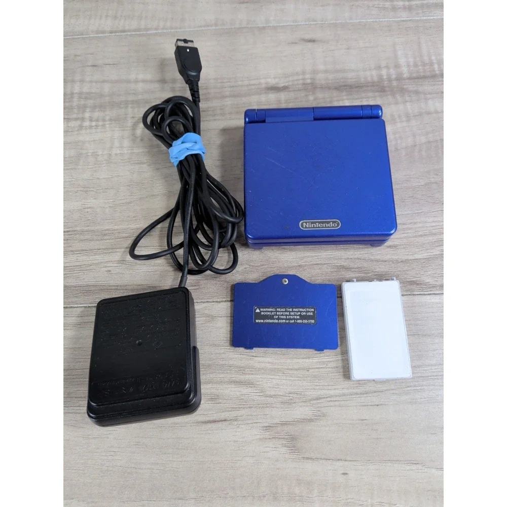 Nintendo Game Boy Advance SP Blue ( FOR PARTS OR NOT WORKING )